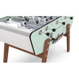 Baby foot de terrasse avec monnayeur - Zoom sur les pieds en bois moabi et la caisse pastel pour une terrasse moderne.