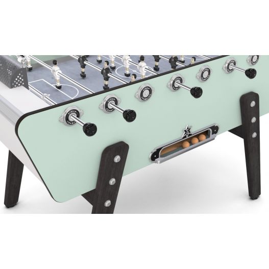 baby-foot Champion Collector Outdoor vert pastel avec détails des paliers et signature sonore à chaque but