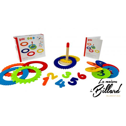 Contenu complet du jeu Goki avec anneaux en feutrine, chiffres en couleur, socle en bois, boîte et notice.