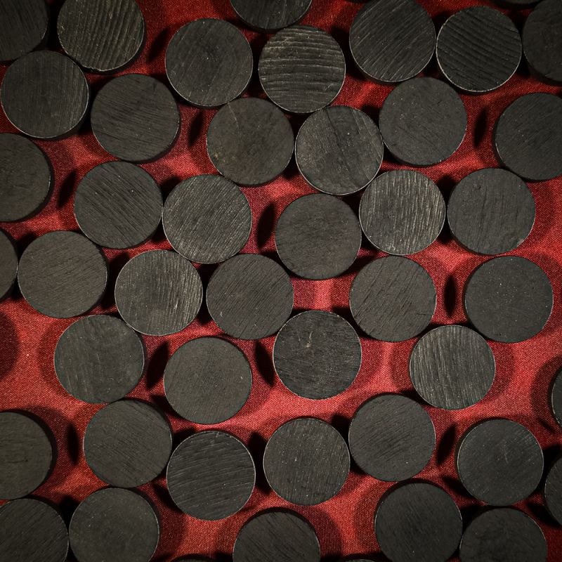 pions noirs 30 mm avec une epaisseu de 7 mm