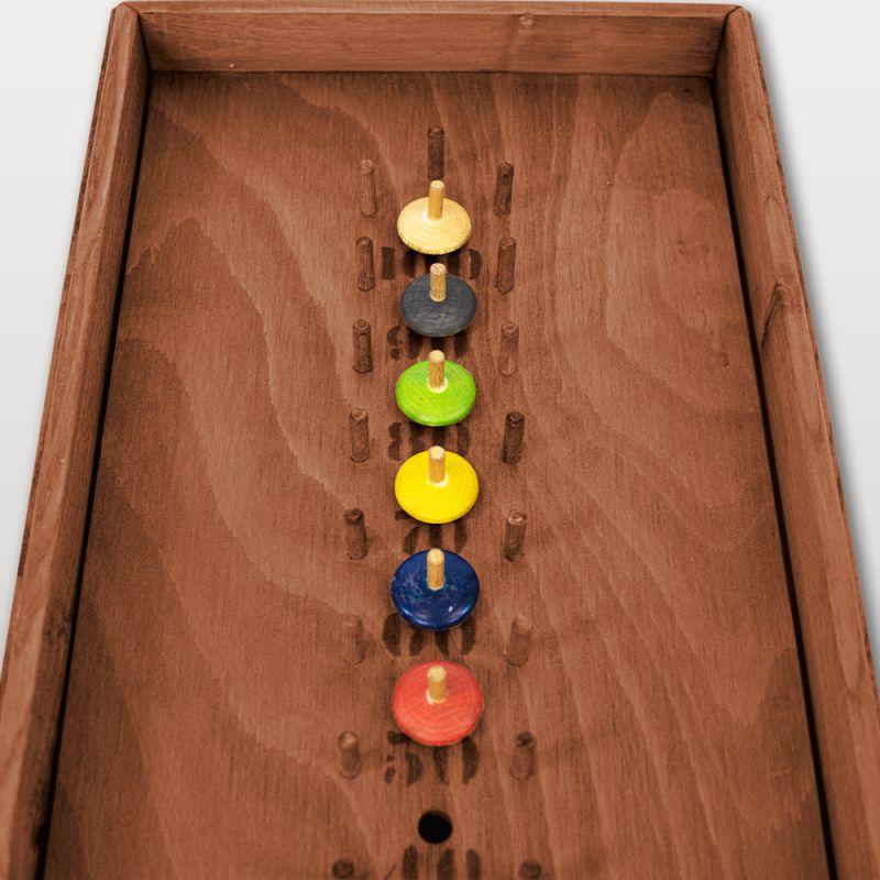 Alignement de toupies colorées sur plateau Laby Toupies